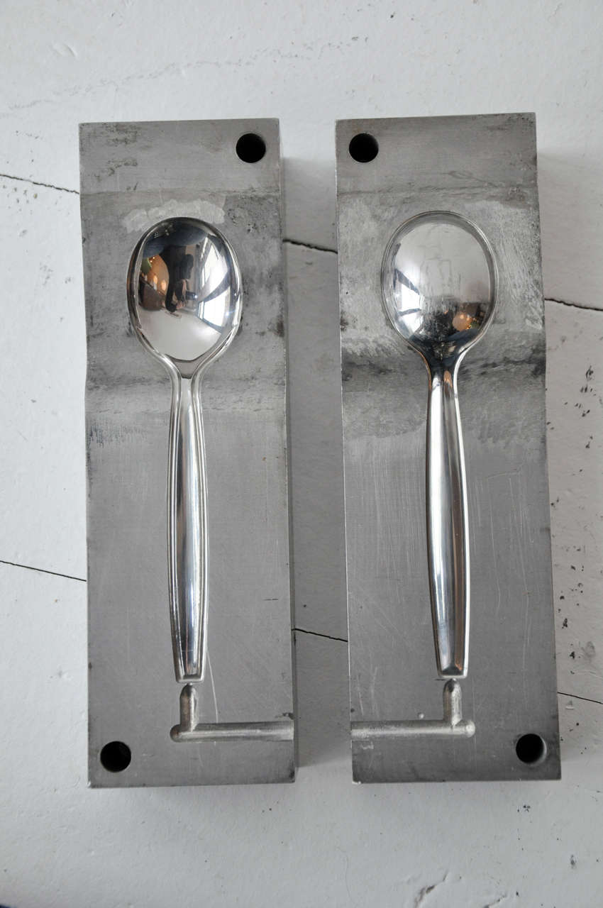 Vintage spoon molds, that were used by pouring molten metal into the channels, filling the shape of the spoon and hardening to create the metal utensil.  Measurements are for each half.