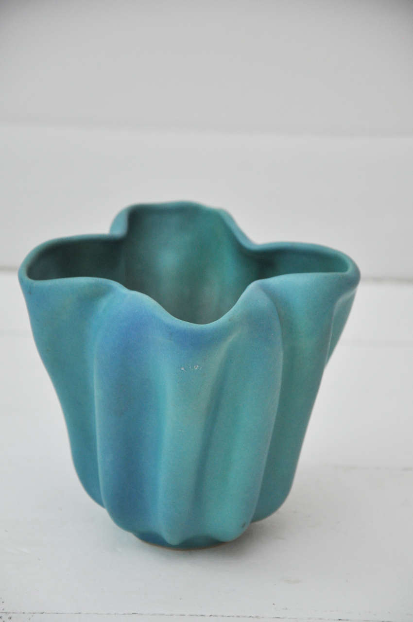 Authentic Van Briggle pottery in the signature matte turquoise glaze.  Signed on the bottom.  Can be used as a vase or as a beautiful decorative object,  