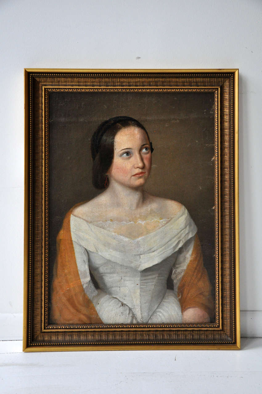 Painting of a Hungarian woman in a gilt frame. A beautiful and realistic portrayal of a woman in traditional Hungarian garb relevant to the period.