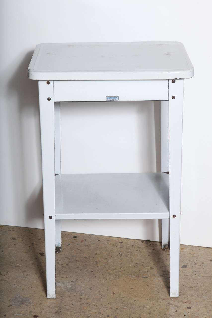 All White Enamel metal Wash Stand or Night Stand with Shelf - stamped The Porcelain & Manufacturing Co. PEMCO Baltimore, Maryland.  Table provides ample storage for small space.  Great for Bathroom use or as Printer Stand