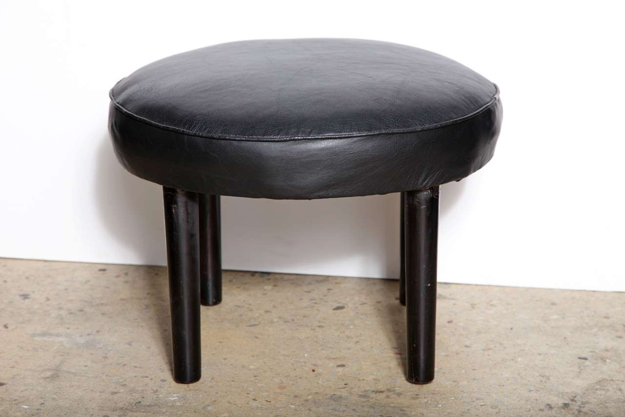 Russel Wright American Modern Series for Conant Ball Black Leather & Wood Ottoman, Occasional Table, Coffee Table.  Featuring 4 ebonized Birch legs and round seat/surface newly upholstered in Black Leather