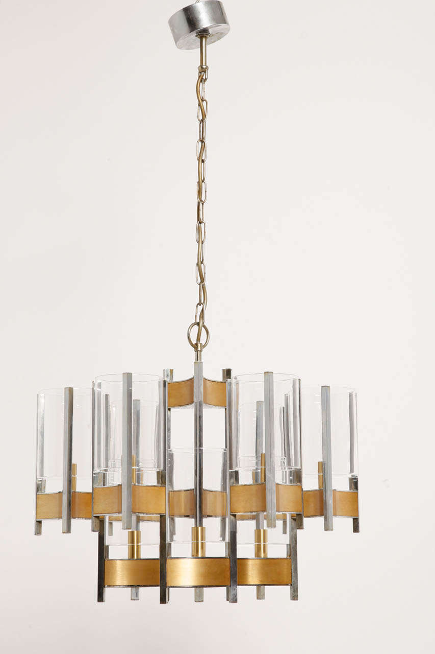 Chrome with brushed brass insets and glass cylinder shades.