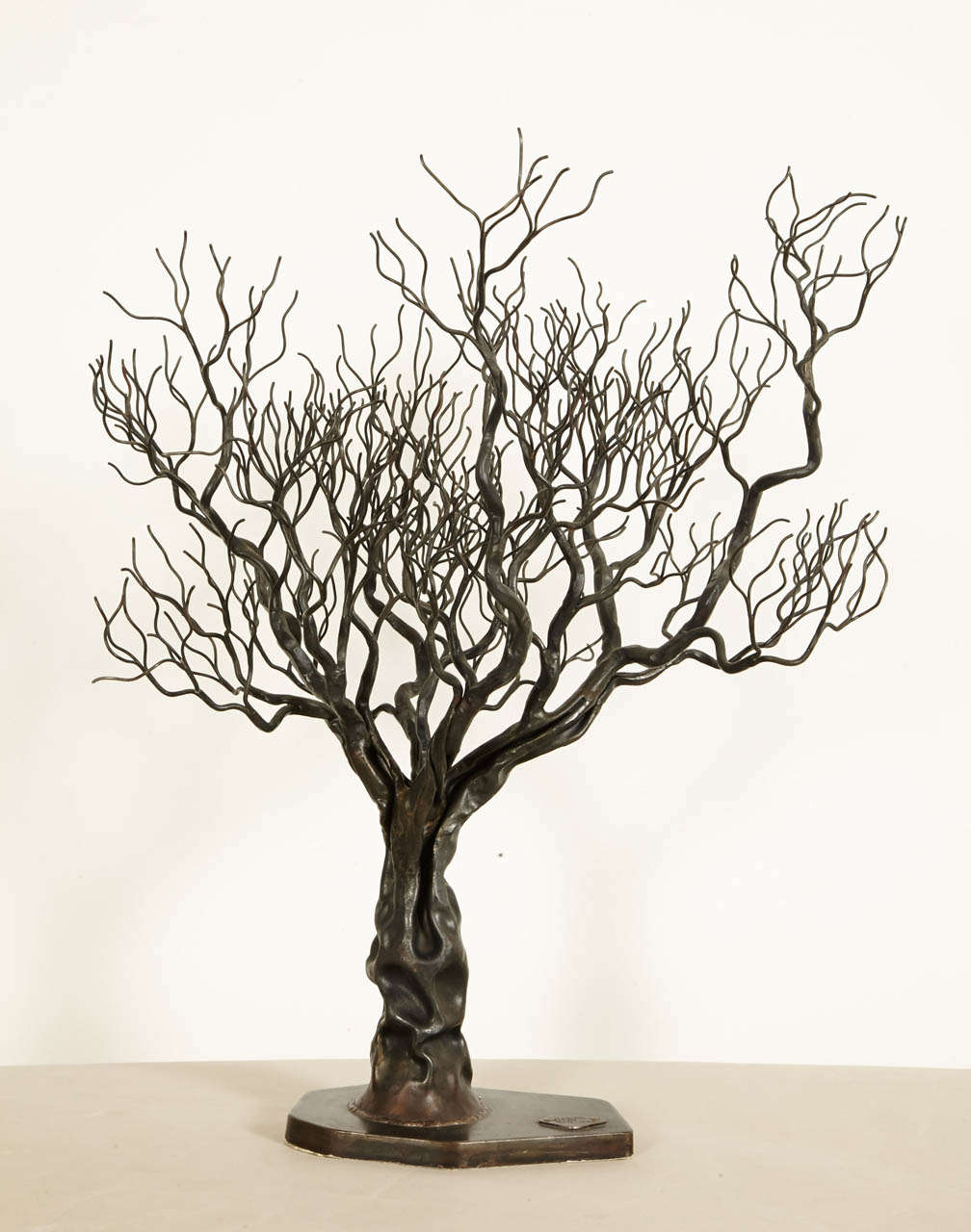 Forged iron olivetree, 2012, by Manuel Simon (1978 -)
Patinated iron sculpture,unique piece.
Dated and signed triangular base.

Manuel SIMON, was a student at Beaux Arts school in Marseille (South France), then worked near the sculptor François