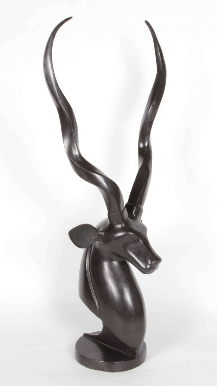 A substantial bronze sculpture of a greater kudu.