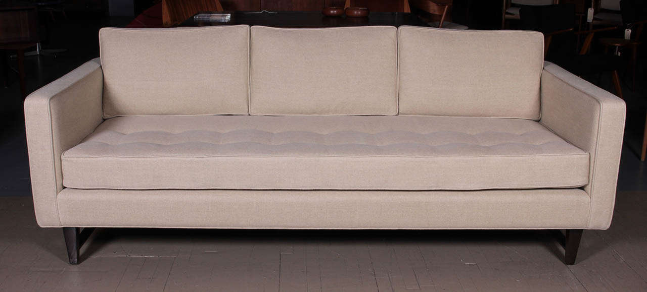 3 seat sofa with walnut frame and button tufted seat