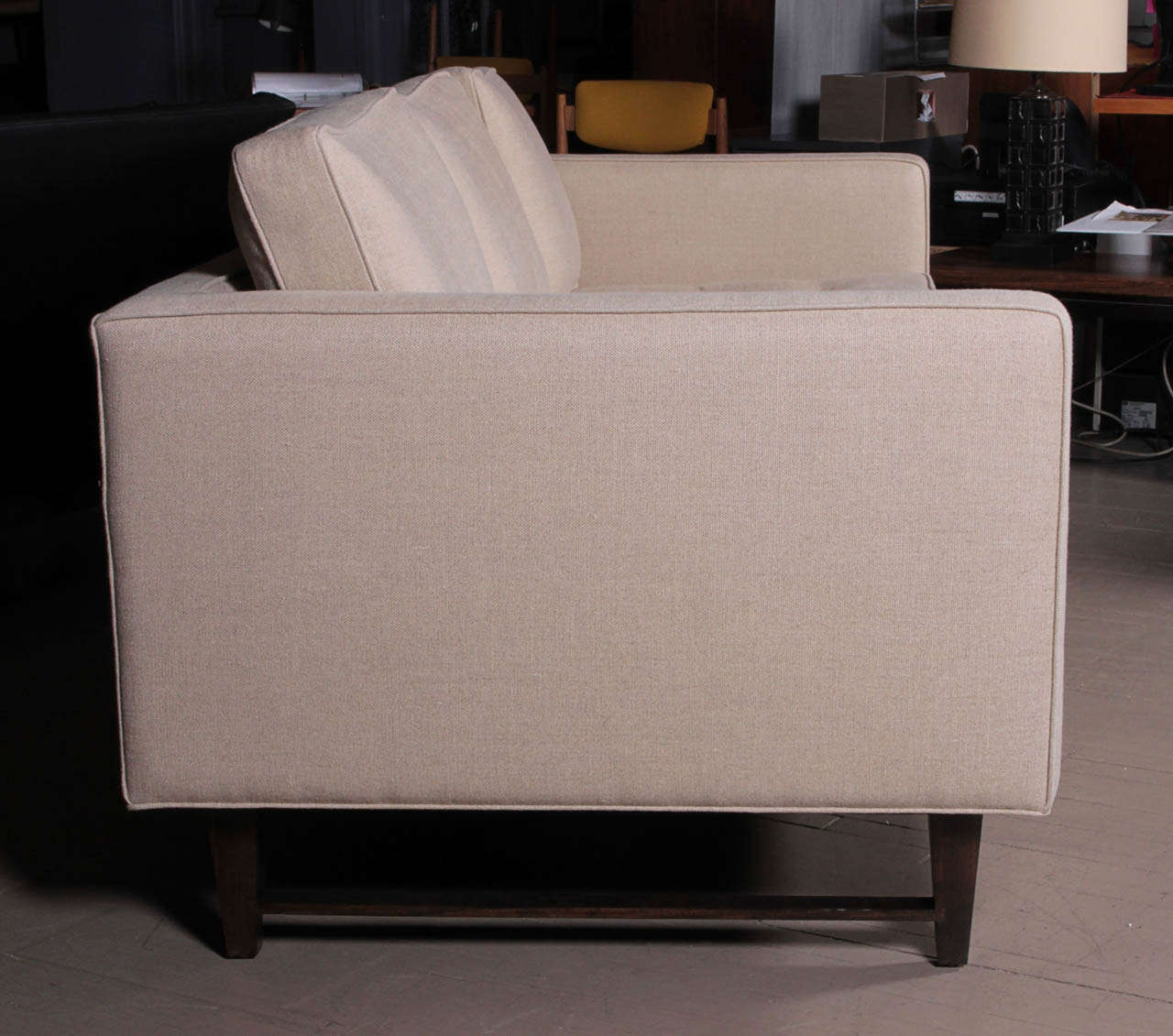 American 3 seat sofa with walnut frame and button tufted seat