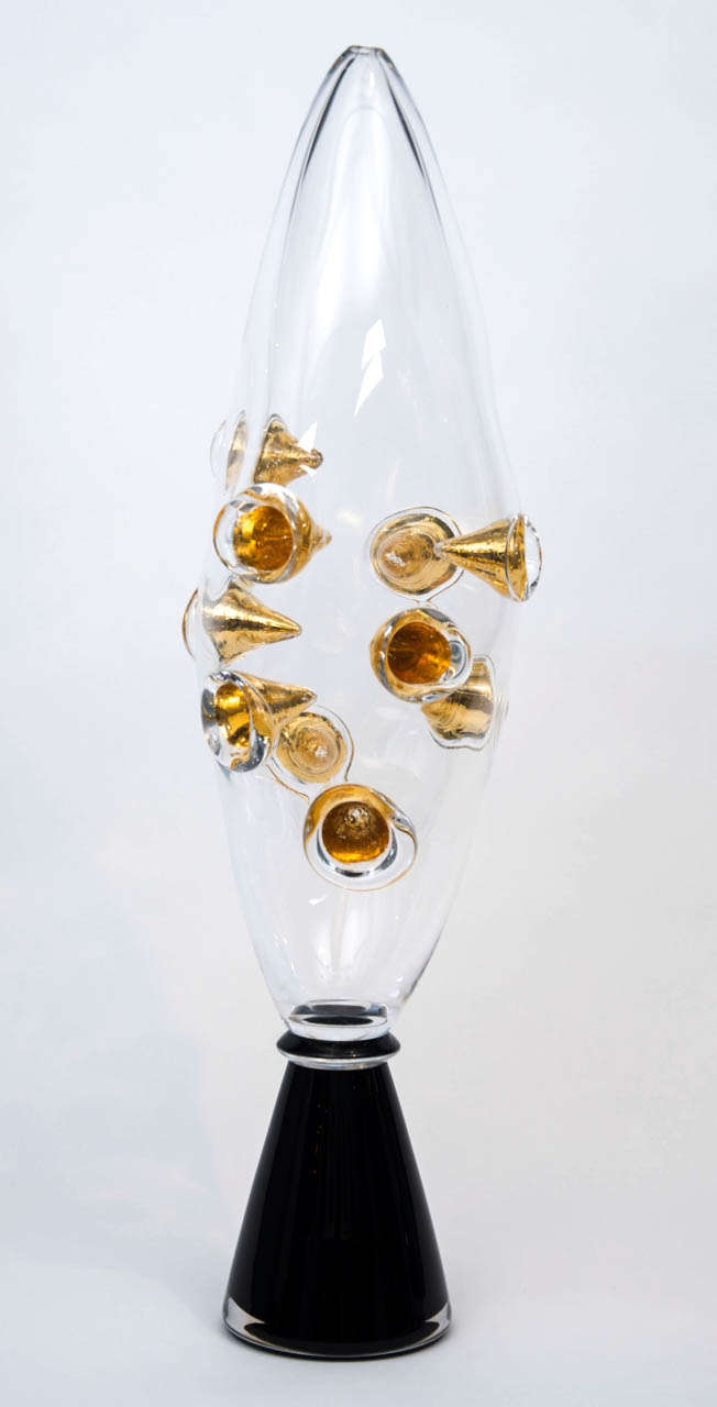 Constellation is a unique glass sculpture created from clear and black glass with gold leaf detail. Handcrafted in blown and sculpted glass by the British artist Louis Thompson.

Accomplished glass artist Thompson explores illusion and the