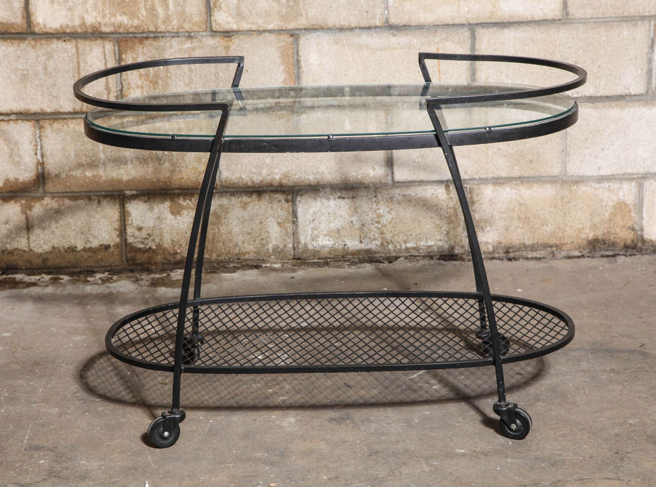 Rarely-seen wrought iron serving cart by Russell Woodard for Lee Woodard & Sons. 

Matching dining set also available in a separate listing.