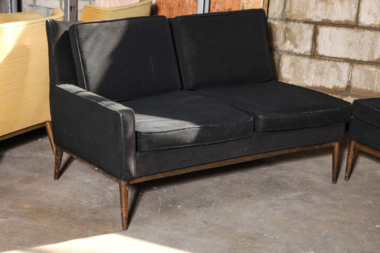 Store closing-- last day is 7/31. Offers welcome! Rarely-seen sectional version of the model 1307 sofa. Handsome two-piece sofa with sleek, tapered legs designed by Paul McCobb for Directional. Measurements are 50.5 W x 32 D x 30 H