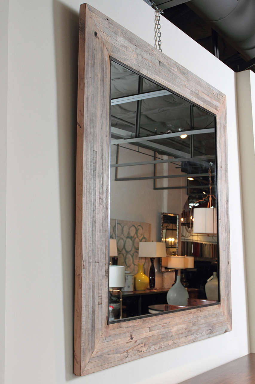 Transitional Style Large Maple Wood Mirror Frame Crafted from Reclaimed Vintage Maple Elements.
Textures of blonde and grey maple wood colors fill through out the mirrored frame. 
The patented iron metal holds the mirrored glass in place around