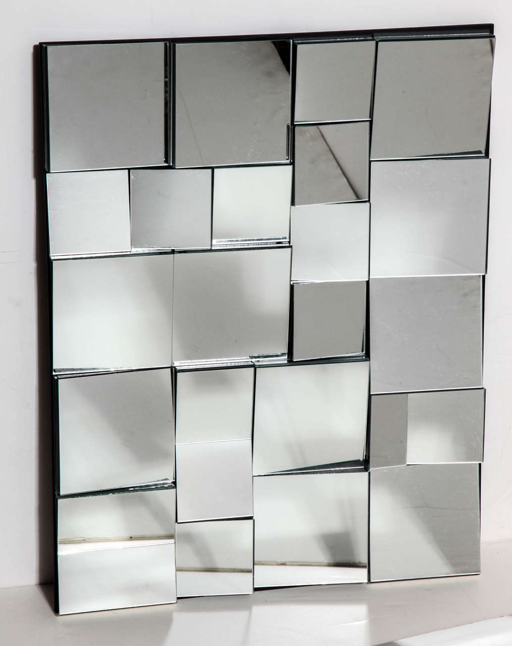 Neal Small faceted Smaller Slopes Mirror from 2000 Limited Edition Series of 35. Features multiple Mirror shapes on Black lacquered Wood frame. Number 25 in the series of 35. Hang horizontal or vertical. Never hung. While in New York Neal Small