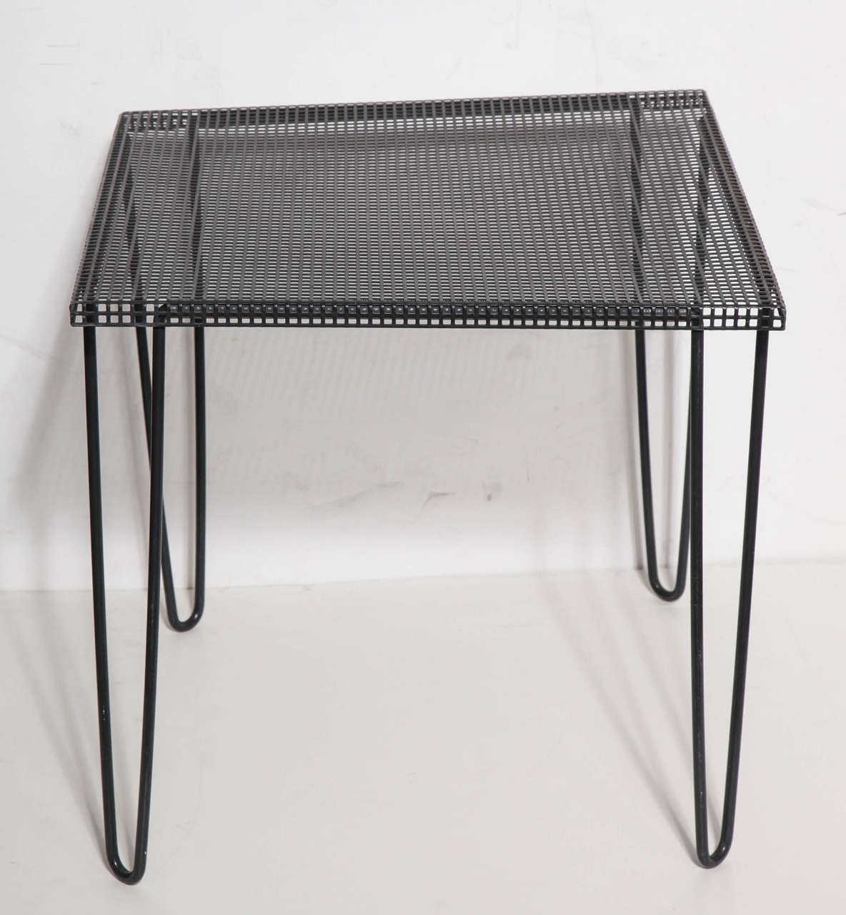 European Pair of 1950s Mathieu Matégot style Perforated Black Iron Occasional Tables 