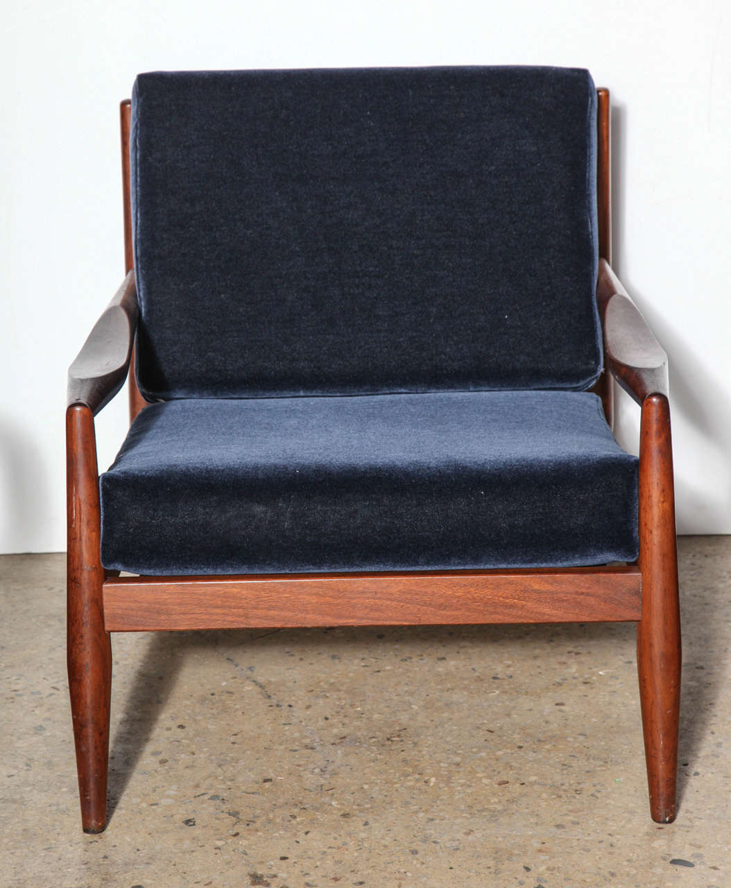 International Modern style Adrian Pearsall designed Model 834 C for 
Craft Associates Lounge Chair with 5 Windsor style spindle back supports, open legs and scooped Arm rests.  Newly reupholstered in Navy Blue Velvet Cashmere.  (seat 16