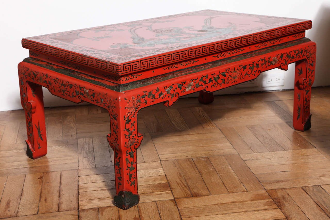 A Pair of Carved and Red Chinoiserie Decorated Lacquer Coffee Tables, France, c. 1920
The Tables Are Not An Identical Pair, Each Top With An Individual Design.

$7,900 for the Pair
$3,900.00 Each if Purchased Individually