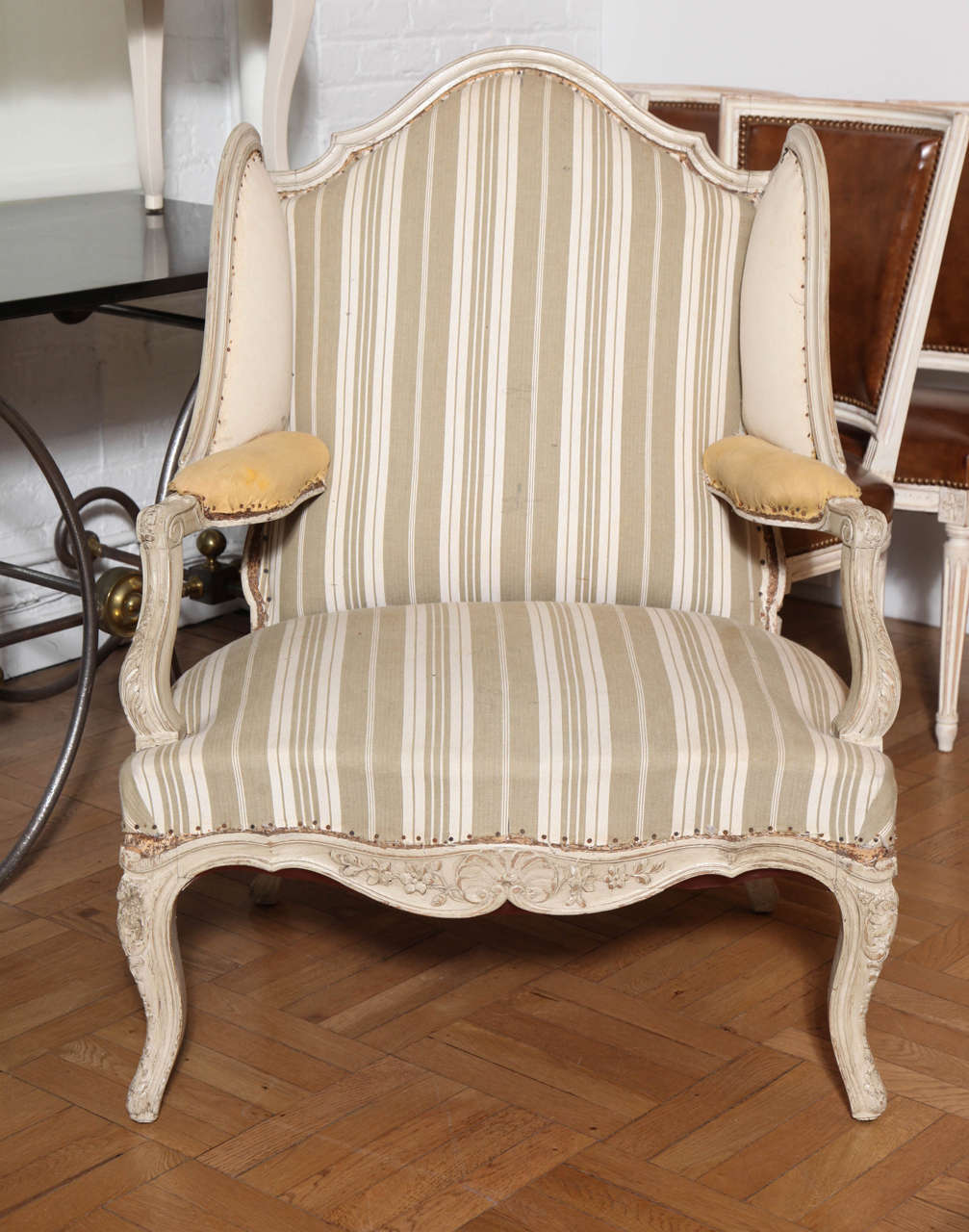A Large Carved and Painted Louis XV Style Wing Back Fauteuil, France c. 1920