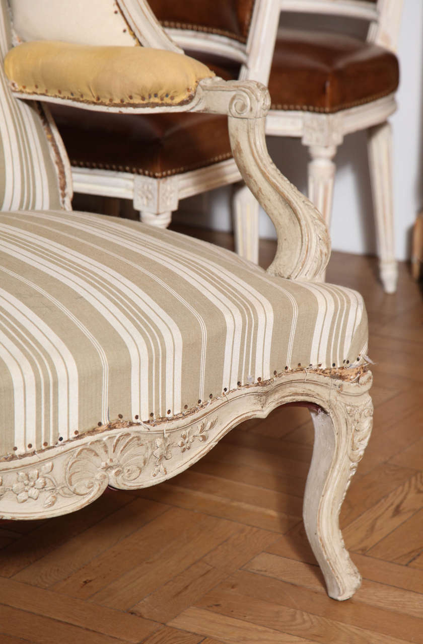 French Large Carved and Painted Louis XV Style Wing Back Fauteuil, France circa 1920 For Sale