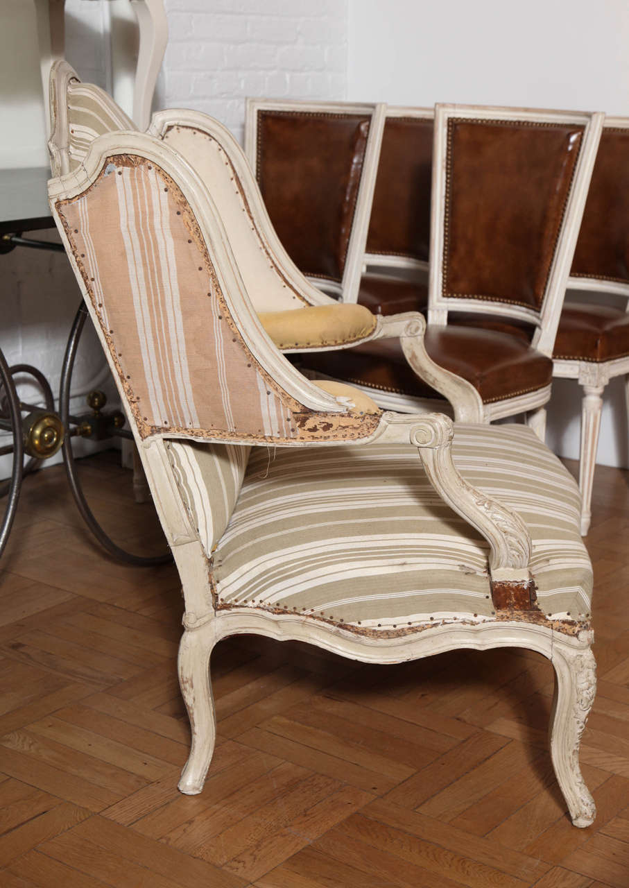 Early 20th Century Large Carved and Painted Louis XV Style Wing Back Fauteuil, France circa 1920 For Sale