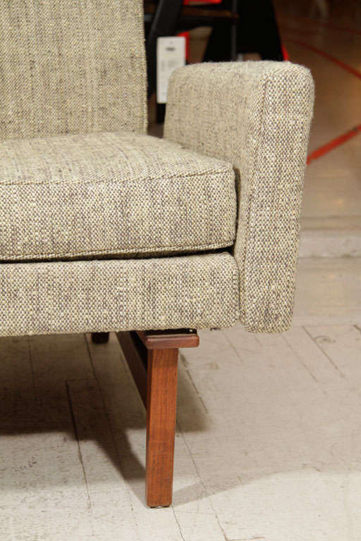 Walnut Jens Risom lounge chair on solid walnut frame