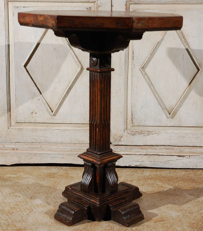 Charming, octagonal, Italian walnut table.