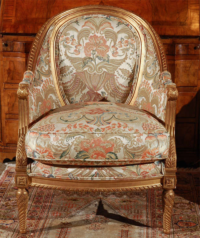 Immaculate, hand-carved, hand-gilded reproduction George VI armchairs.