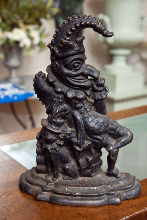 This fabulously-detailed cast iron doorstop is of Punch (of Punch & Judy fame), along with his dog, Toby.  These were quite popular in both the 1890s and again, in the 1930s and this one would add a whimsical element to your home.