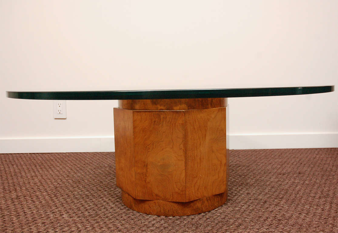Classic polished burled wood pedestal cocktail table with glass top, designed by Edward Wormley for Dunbar in the 1950's.