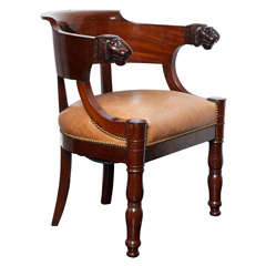 1st Empire mahogany desk chair, carved lionhead terminals