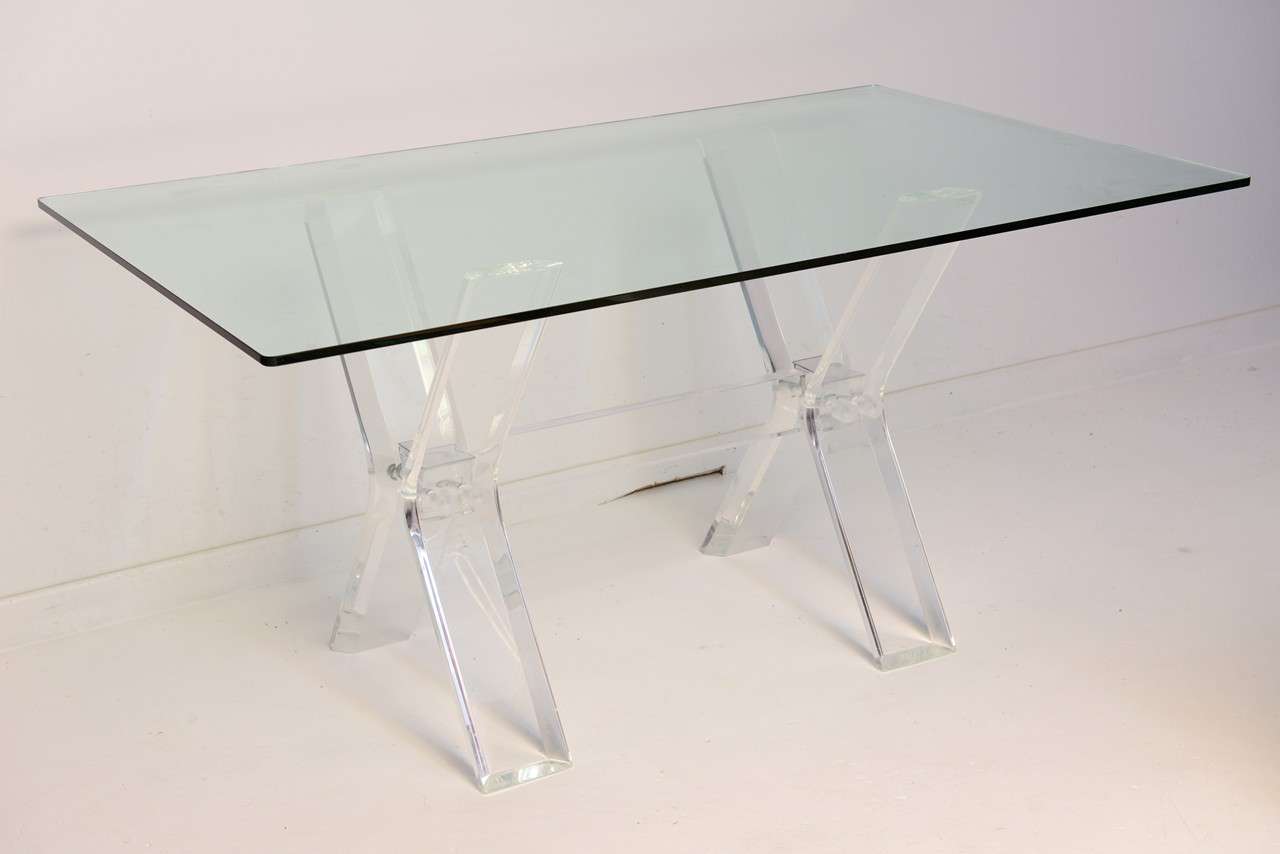 Vintage Lucite sculptural X frame desk or table with a glass top. Lucite base measures 29