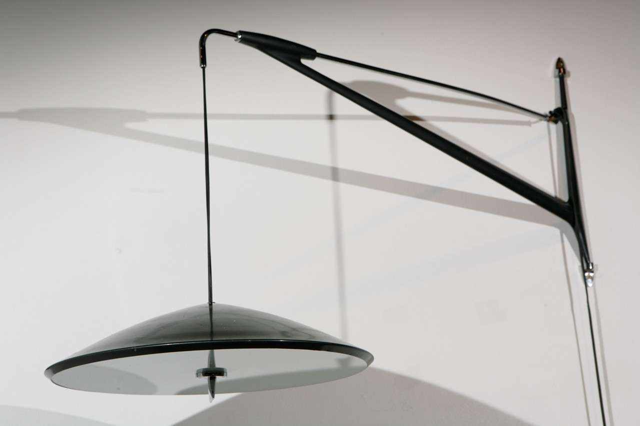 Adjustable reading sconce by Arlus; new diffuser glass.