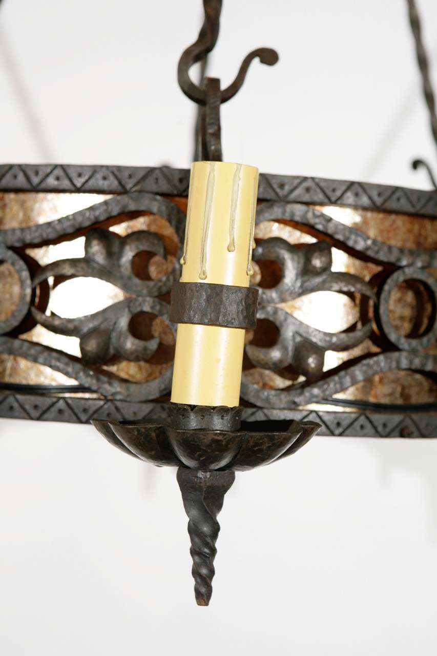 1920s French Iron Chandelier In Excellent Condition In Los Angeles, CA