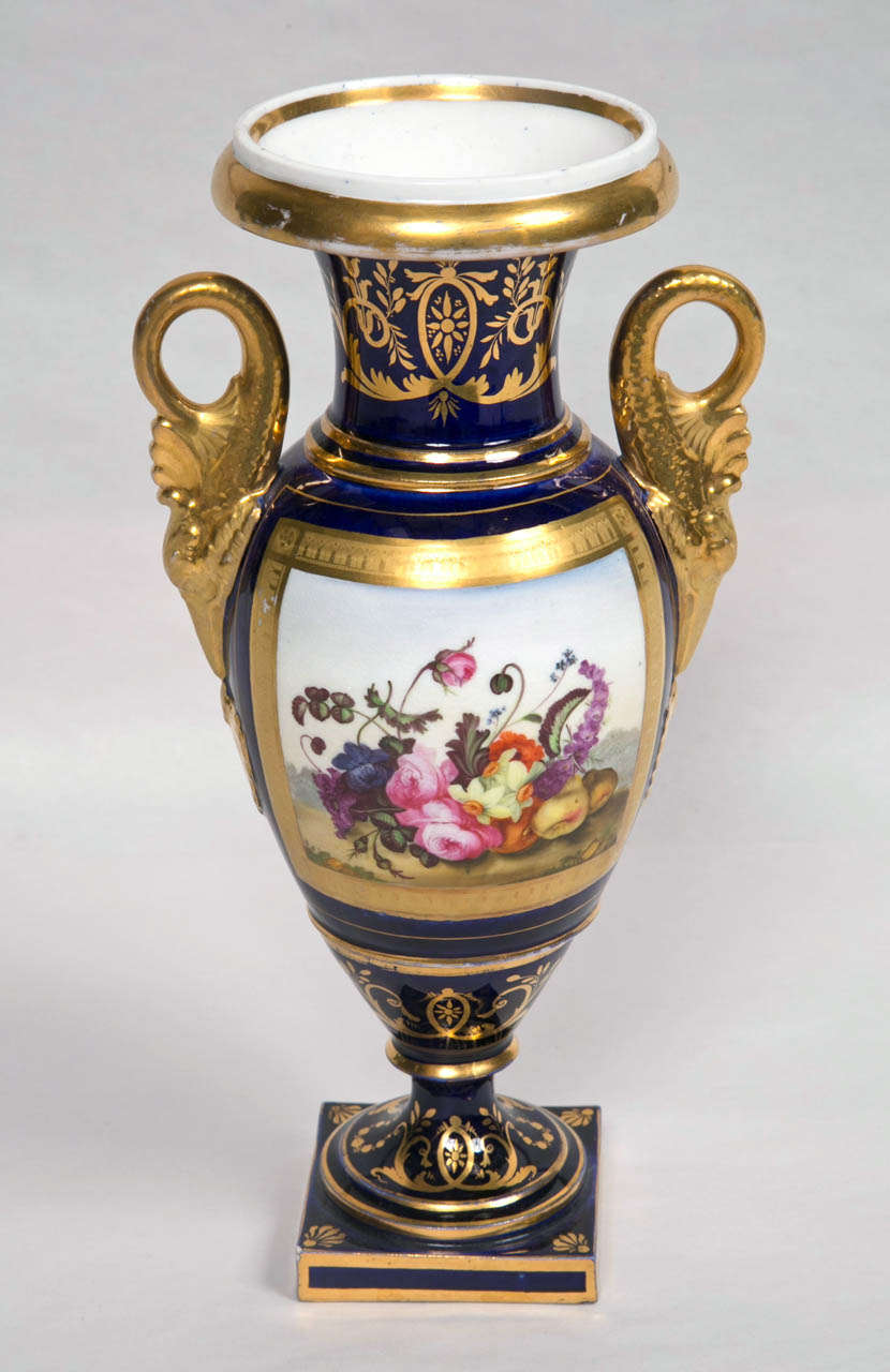 Early English 19th c blue and gilt vase with painted fruit design, burnished & Matte Gilt and dolphin handles