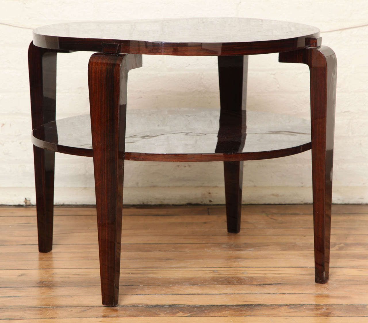 Round Art Deco side table with shelf.