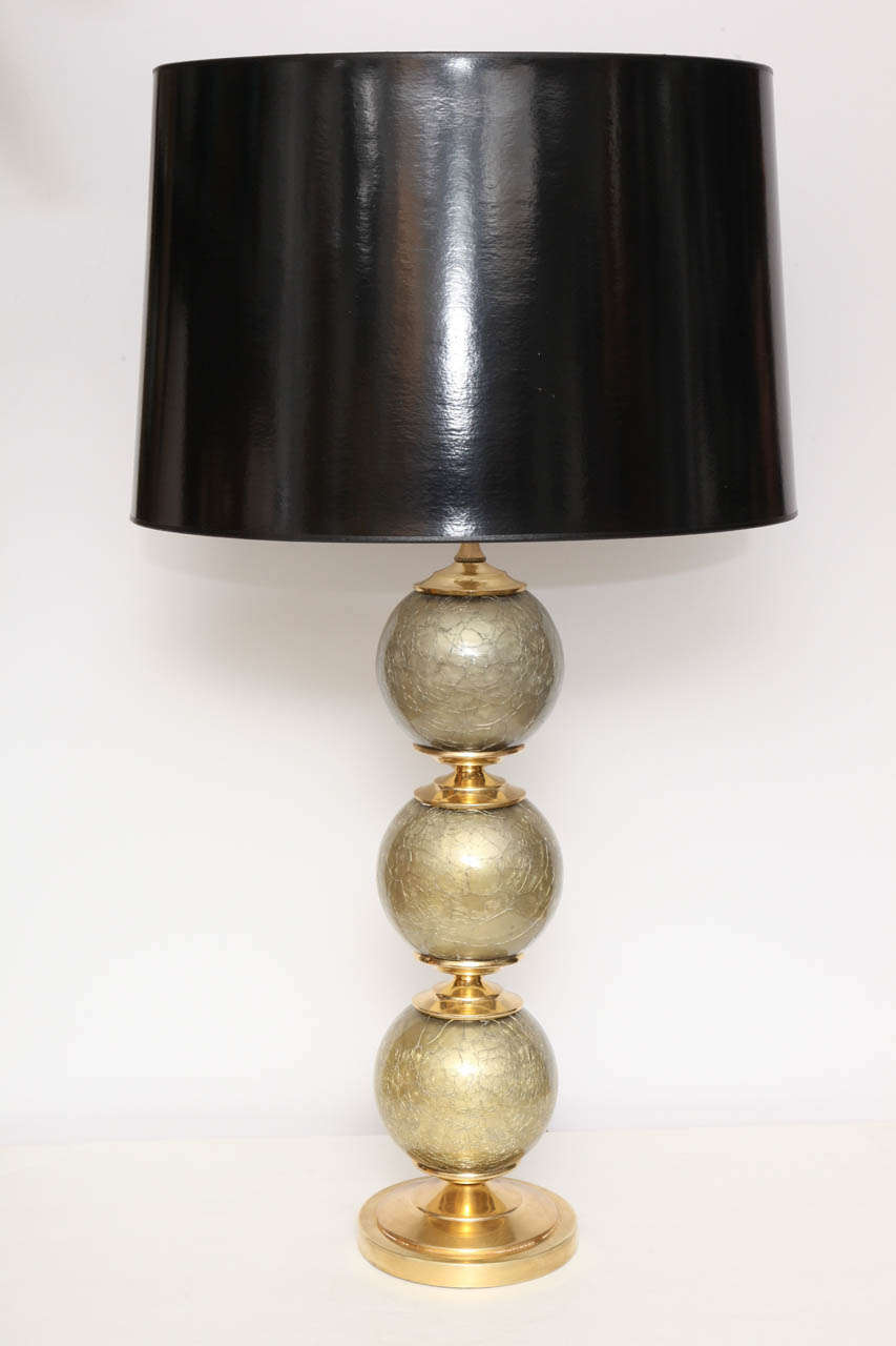 Pair of Murano, Italy table lamps in a golden/taupe color with brass details.
Including lamp shades, height 31". C 1950.