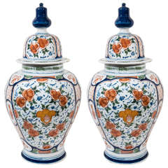 A Pair of Dutch Delft Polychrome Covered Jars