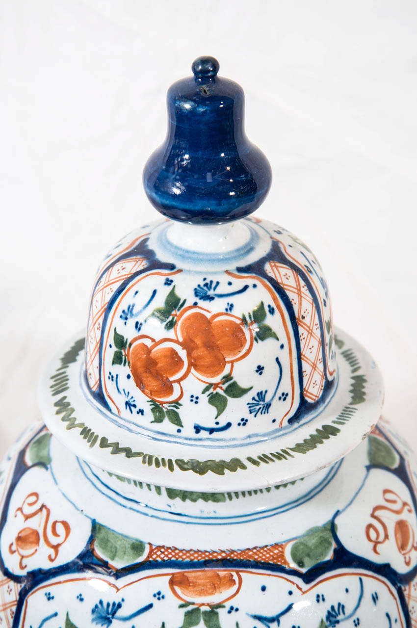 A Pair of Dutch Delft Polychrome Covered Jars In Excellent Condition In Katonah, NY