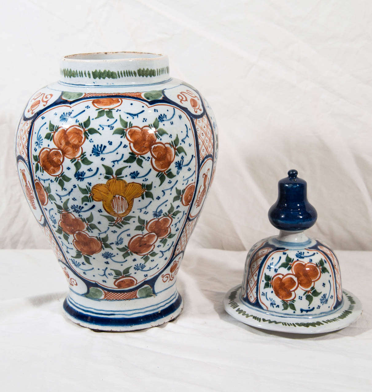 18th Century and Earlier A Pair of Dutch Delft Polychrome Covered Jars