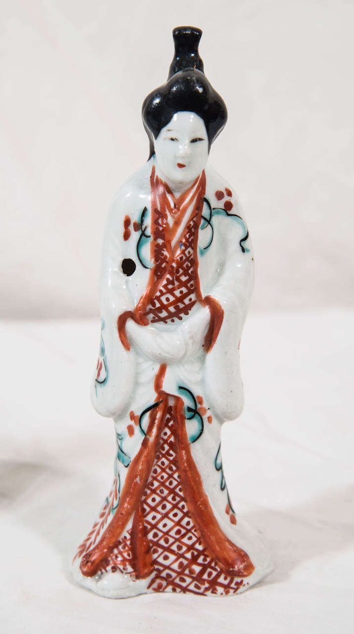 Porcelain A Pair of 18th Century Japanese Figures of a Man and Woman