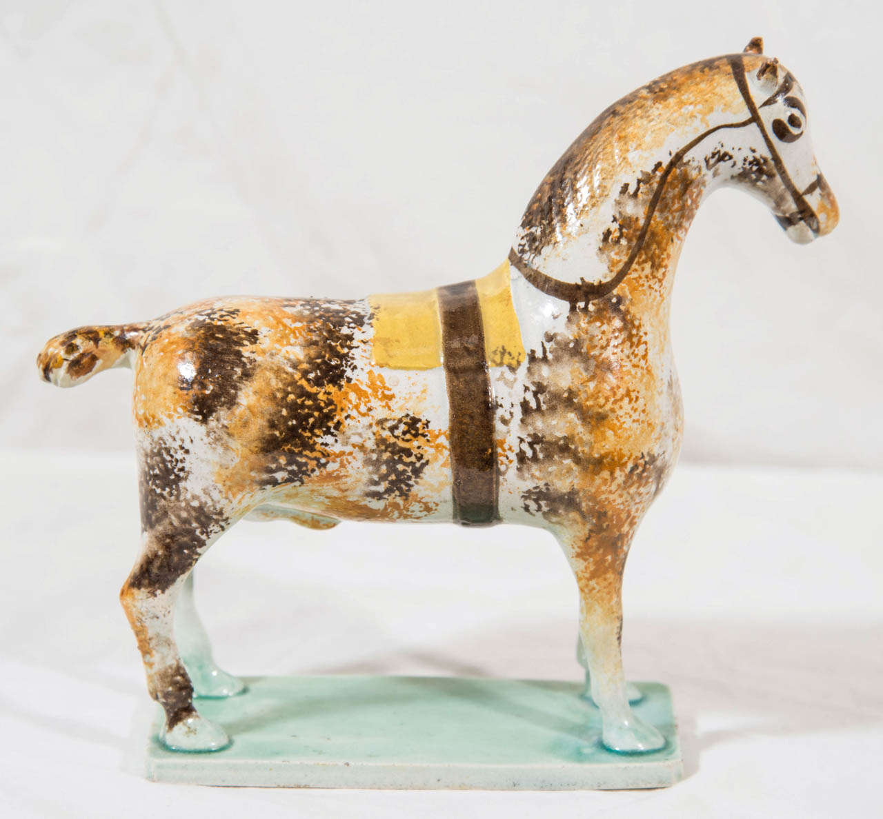 English An 18th Century Pearlware Model of a Race Horse
