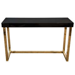 A French Brass Base and Black Lacquer Top Console