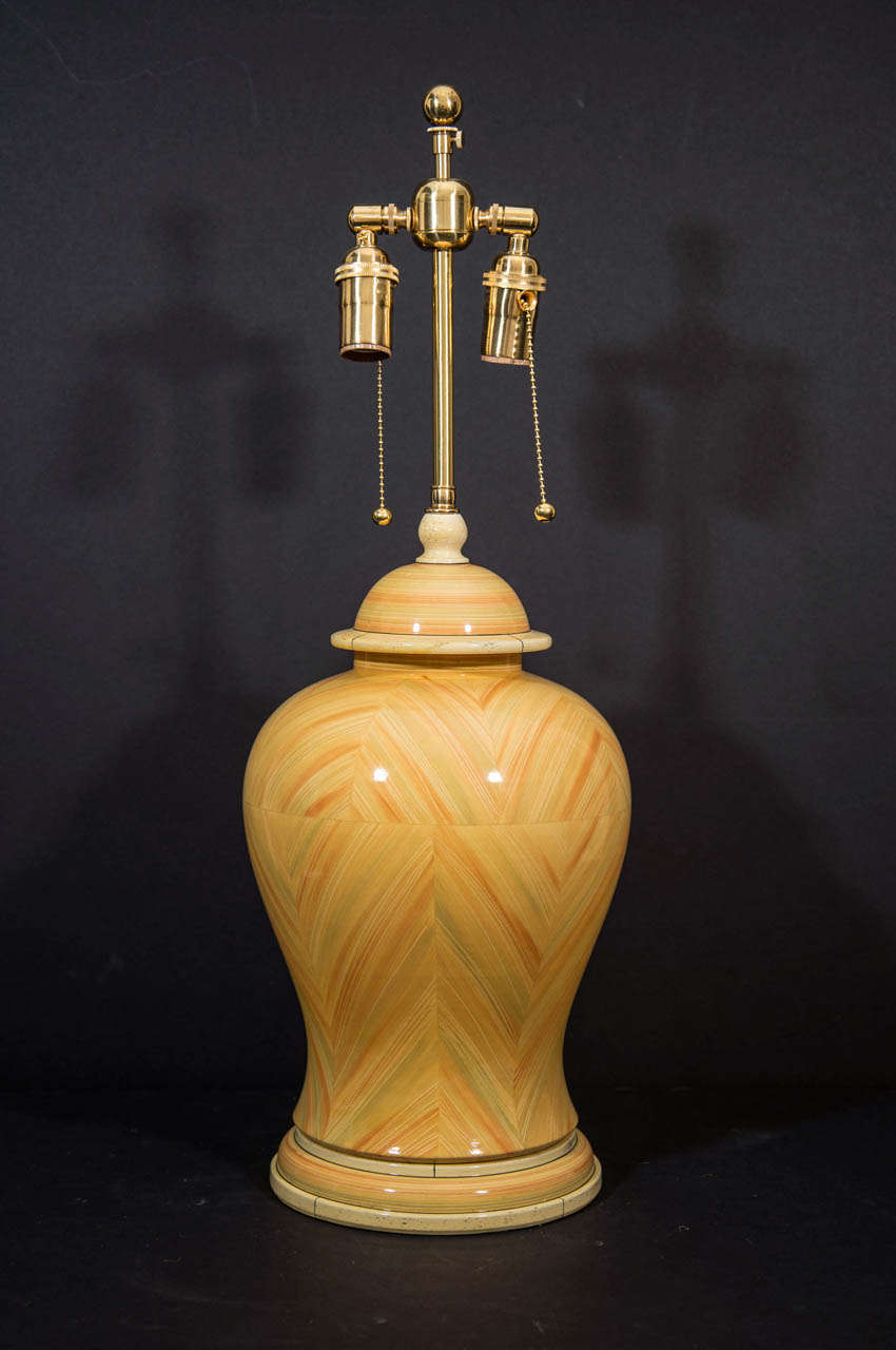 Ginger Jar Shaped Two Light Ceramics Lamps With Herring Bone Pattern and With Painted Faux Ivory Trim.