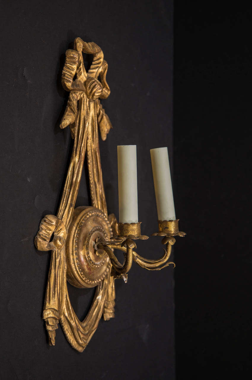 19th Century Giltwood And Gesso Two Light Sconces With Bows And Tassel Motif For Sale