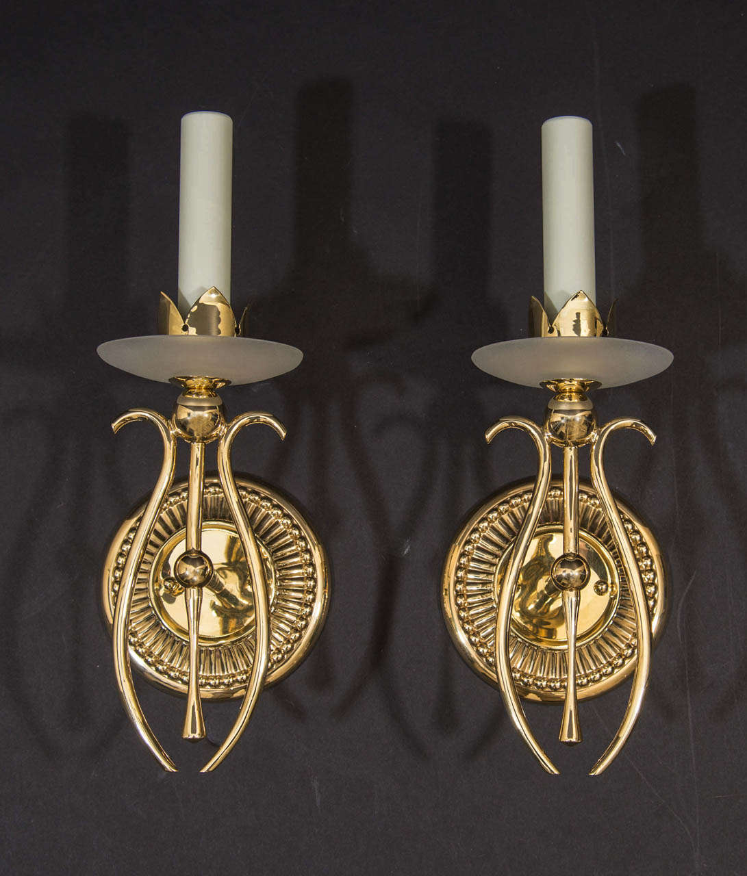 Polished brass one light sconces with frosted glass bobeches, Mid Century.