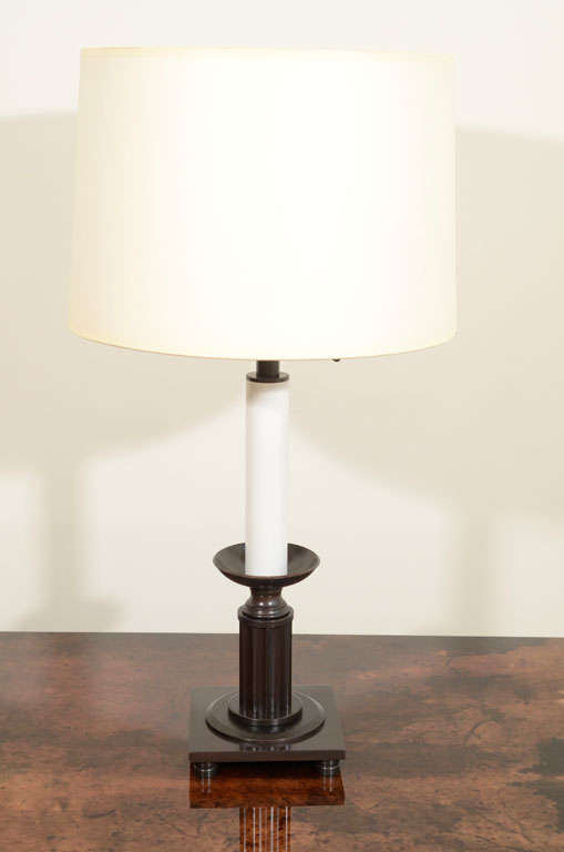 The short fluted column raised on a square base with bun feet, a candle stem above with electrical fitting. (The shade is not included in the price.)