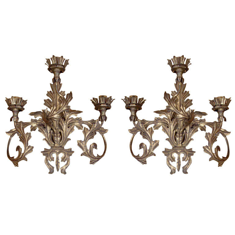 Decorative and charming pair of three light sconces in a gilt metal, Italian, Baroque style, can be re-electrified to US code