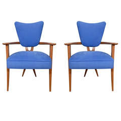 Four modernist armchairs