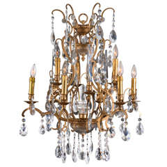 Lovely Twelve Light Crystal and Bronze Finish Chandelier