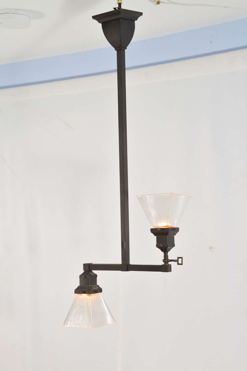 Combination Gas and Electric, turn of the Century, Gas Up and Electric down, Lighting fixture.  Finish is oil rubbed bronze.  There are two of these fixtures, priced individually at $1200. each.  They would be beautiful as pendants.  Glass is