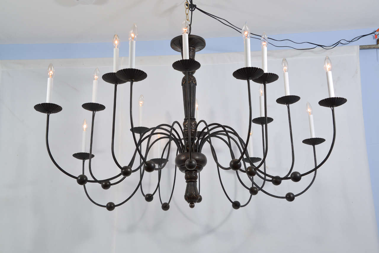 19th Century. 16 light, Wood and iron, Italian candle fixture, electrified.  The fixture is 33