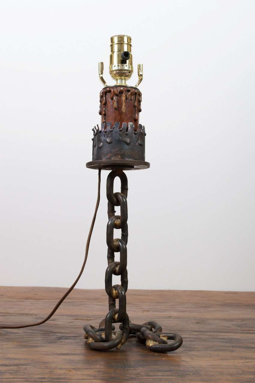 Vintage hand made candlestick as table lamp.  Welded chain and brutalist style candle cup.  Newly rewired.