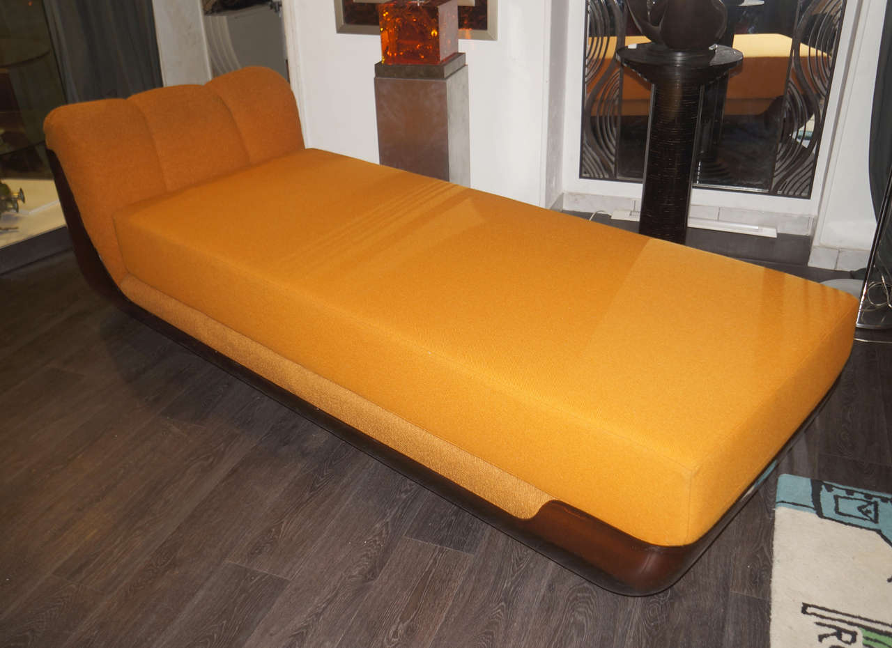 1970s day bed by Bernard Govin with a plexiglass structure and an orange cotton fabric upholstery.